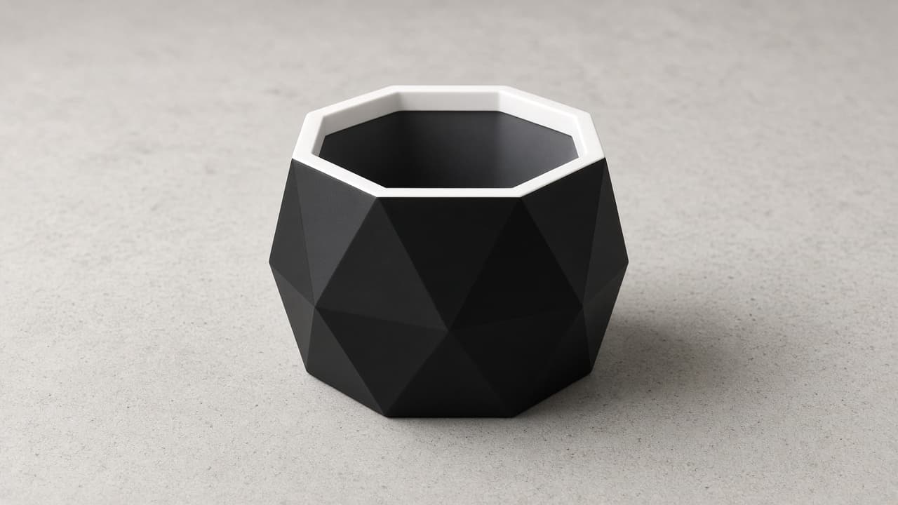 Black geometric planter with white rim — Lumen Home hero